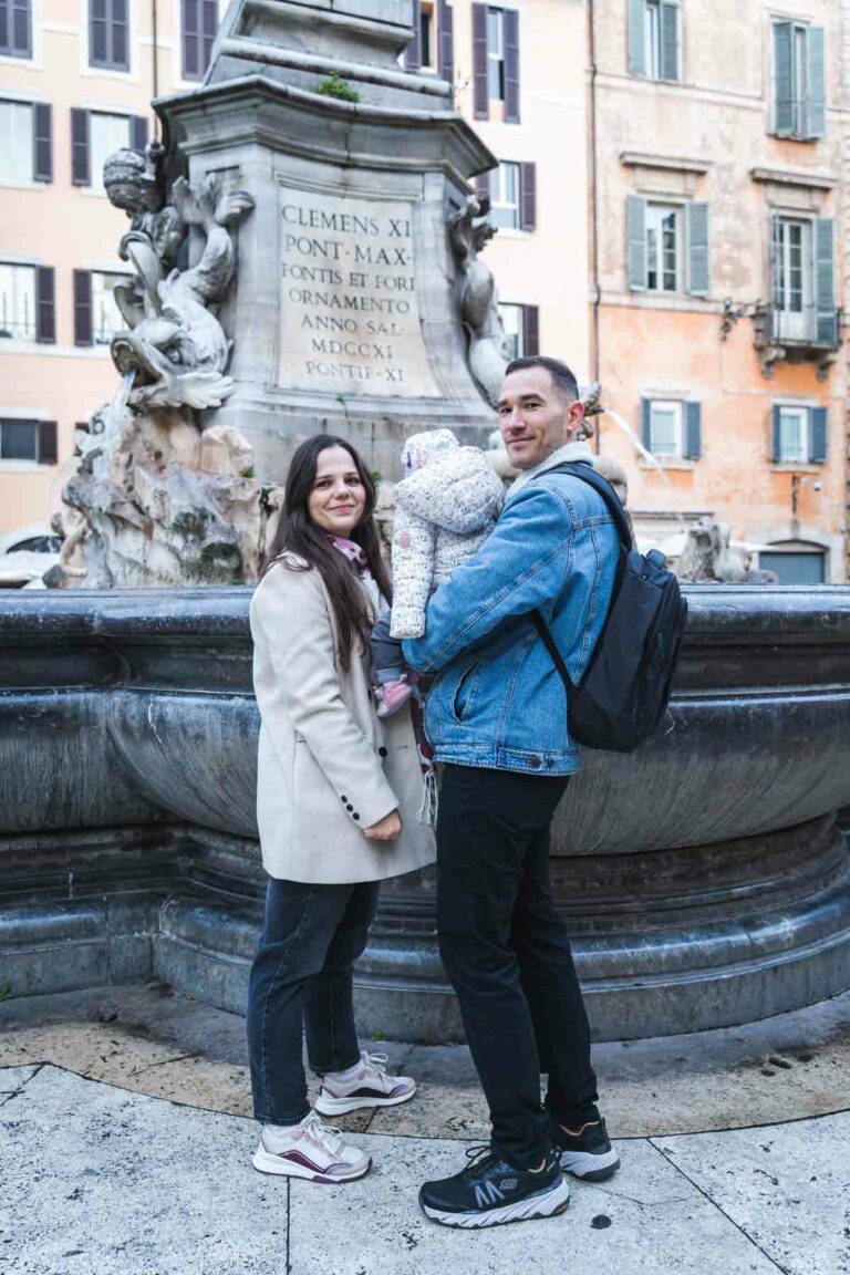 Young man and woman at a roman fountain near to the Pantheon